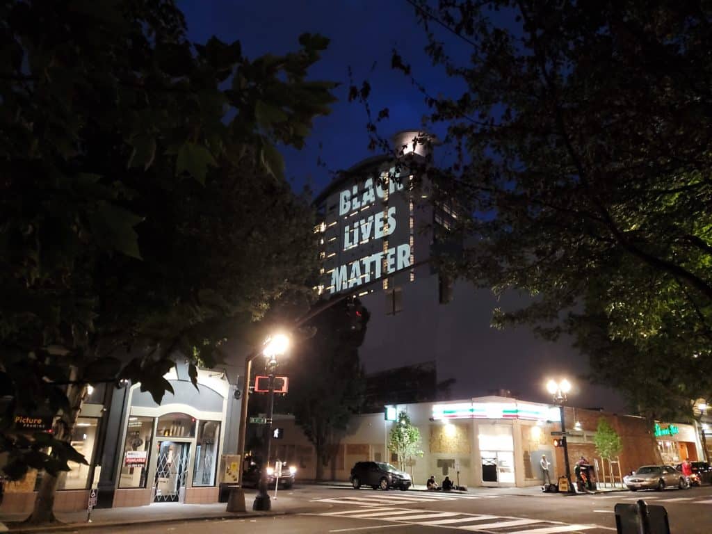 The words "BLACK LIVES MATTER" projected onto the side of the Hatfield Courthouse in mid-June 2020.