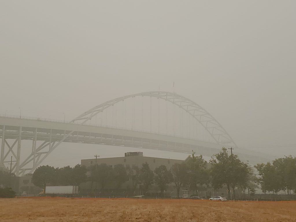 The Fremont Bridge seems to disappear into the thick smoke of 2020's summer wildfires.