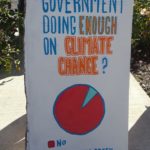Sign saying "Is the government doing enough on climate change?