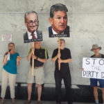 Photo of 4 people holding signs about Manchin's dirty deal